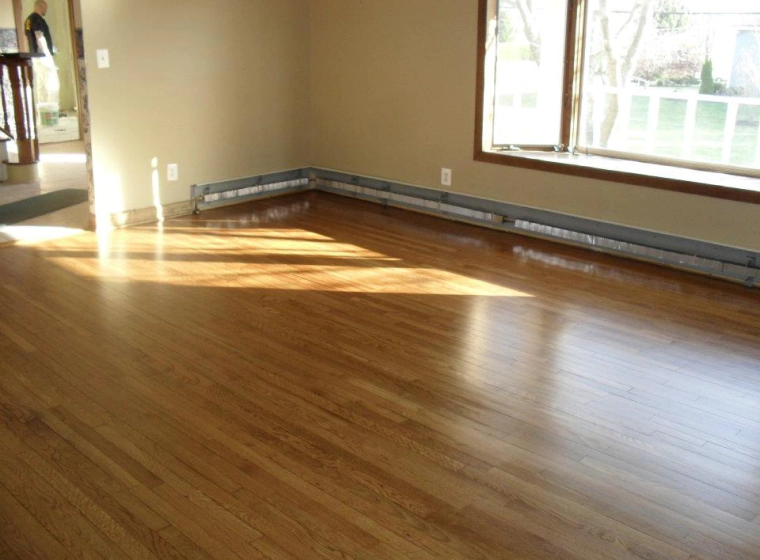 newly installed living space wood flooring